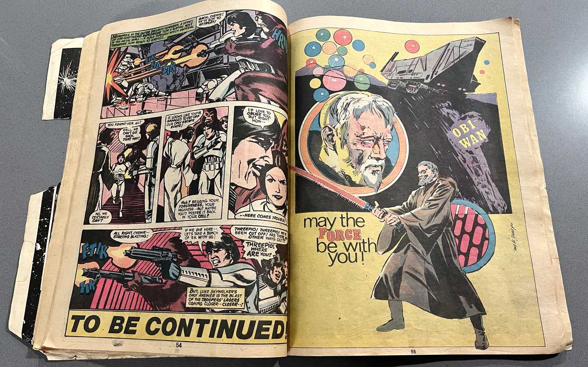 Photo of pages 54 and 55 of my copy of Marvel Special Edition Featuring Star Wars issue no. 3. Page 54 is the conclusion of a chapter. Page 55 is a pin up of Obi-Wan Kenobi. Photo of pages 54 and 55 of my copy of Marvel Special Edition Featuring Star Wars issue no. 3. Page 54 is the conclusion of a chapter. Page 55 is a pin up of Obi-Wan Kenobi.