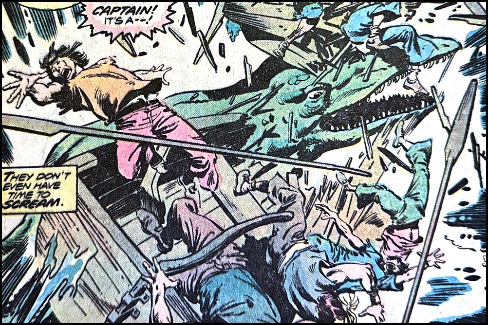 Portion of a panel from this issue showing a dinosaur attacking a rowboat. The rowboat is torn to pieces and five men are being thrown into the air. Someone off-panel says, “Captain! It’s a — !” A caption reads, “They don’t even have time to scream.”